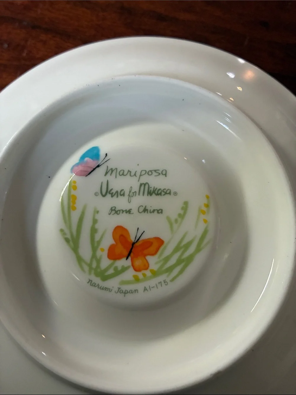 Mikasa White Cup and Saucer with Orange Butterfly and Blue Floral Accents
